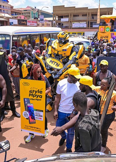 The-MTN-Ugandas-Chief-Executive-Officer-Sylvia-Mulinge-walking-around-the-New-Taxi-Park-engaging-with-travellers-at-the-launch-of-Kabode-Supa-smartphone